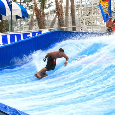 Simulador de surf Fiberglass Flow Rider para equipos de juegos comerciales con capacidad de 160-240 jinetes por hora