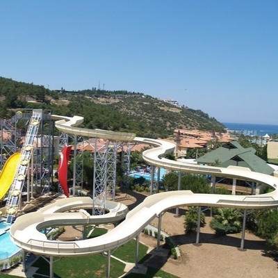 Toboganes acuáticos de encargo de FRP, diapositiva de la familia de la fibra de vidrio de 6 personas, equipo del parque de la aguamarina