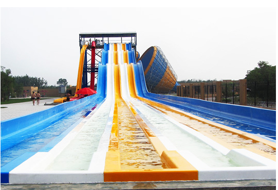 Multi-Lane Rainbow Water Slide for Water Park | 4-Lane Mat Racing Slide | Fiberglass Rainbow Slide Manufacturer Since 1994